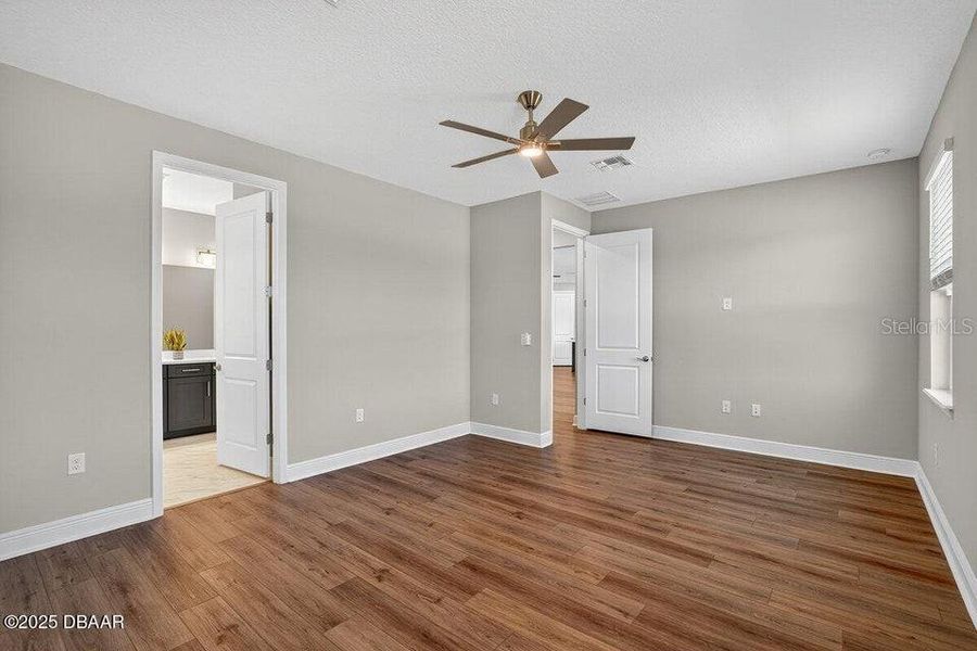 Spacious, unfurnished interior of a new home in Legends Preserve - Reserve Series, Daytona Beach (Image 36). Spacious, unfurnished interior of a new home in Legends Preserve - Reserve Series, Daytona Beach (Image 36).