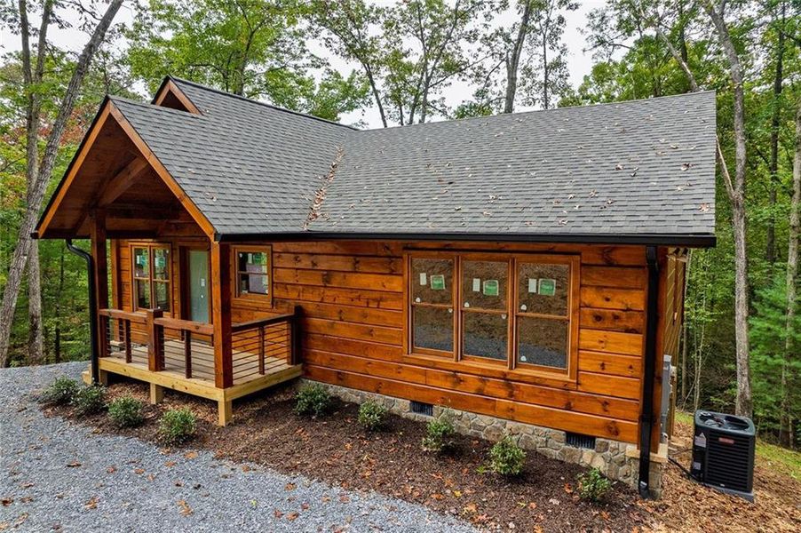 Exterior details and patio area of a home in , Cherry Log (Image 13).