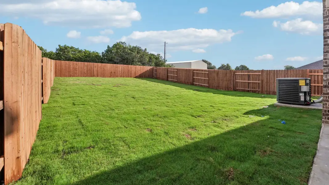 Exterior details and patio area of a home in Bar W Ranch, Leander (Image 3).