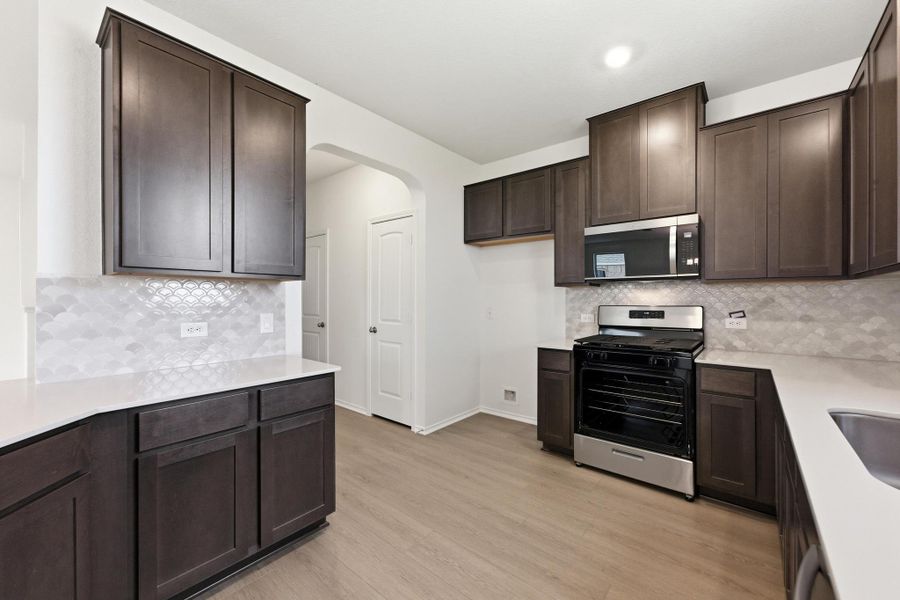 Furnished interior view inside a new home in Salerno - Heritage Collection, Round Rock (Image 13). Furnished interior view inside a new home in Salerno - Heritage Collection, Round Rock (Image 13).