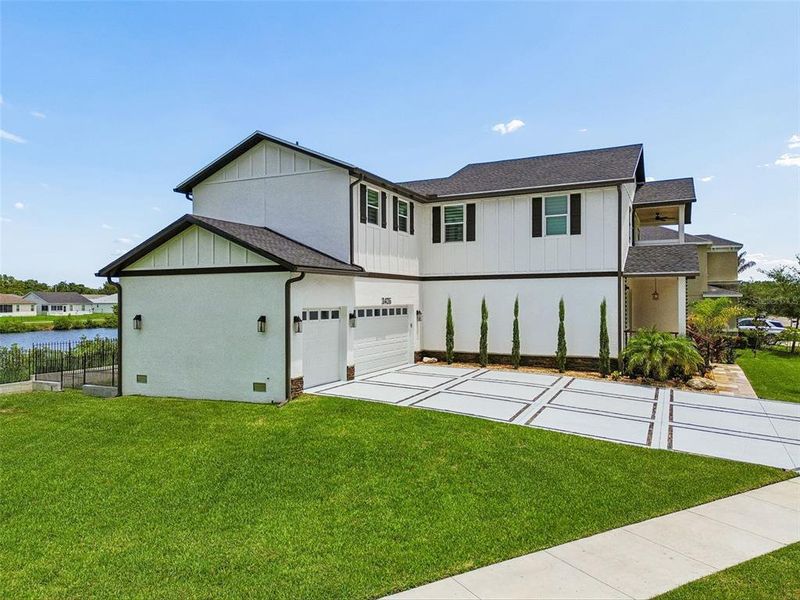 Front exterior of a new home in , Safety Harbor, FL, highlighting curb appeal (Image 2). Front exterior of a new home in , Safety Harbor, FL, highlighting curb appeal (Image 2).