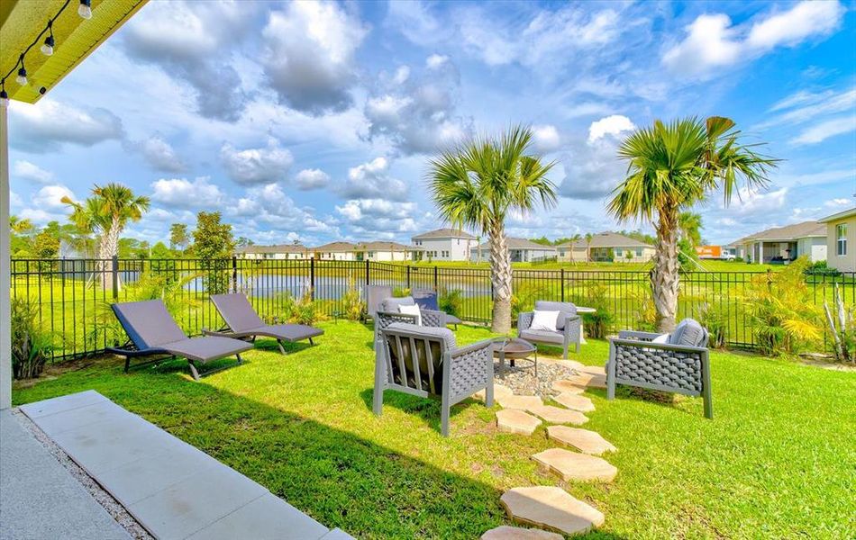 Exterior details and patio area of a home in Archers Mill, Ormond Beach (Image 25).
