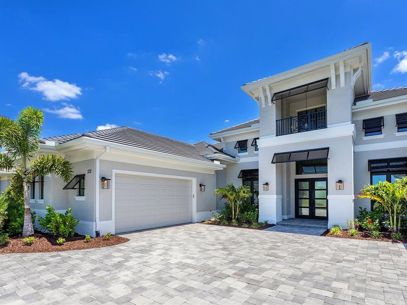 Front exterior of a new home in , Sarasota, FL, highlighting curb appeal (Image 27).