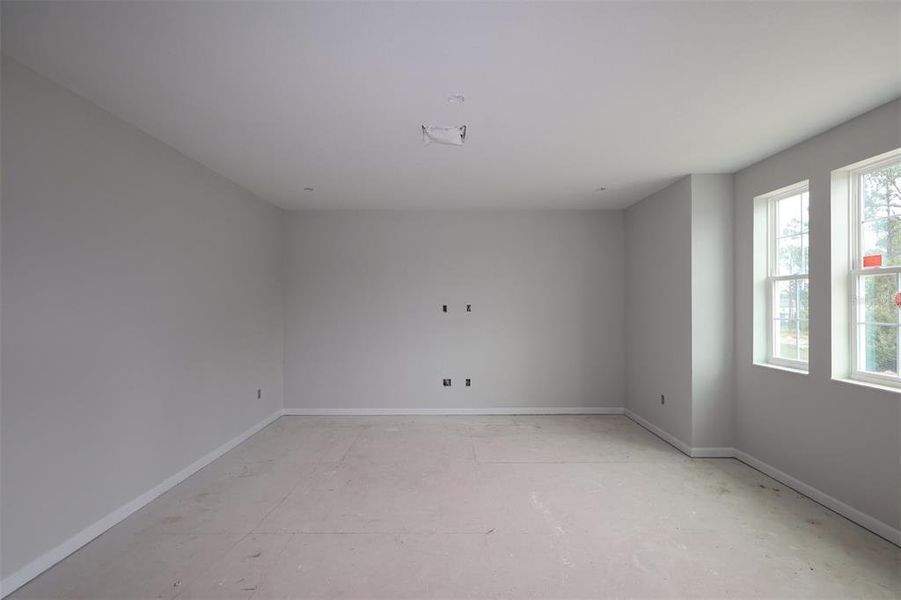 In-progress construction of a new home in Lake Star at Ovation, Winter Garden, FL (Image 13).