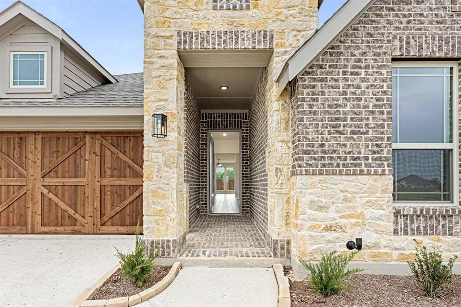 Exterior details and patio area of a home in The Oaks, Red Oak (Image 22). Exterior details and patio area of a home in The Oaks, Red Oak (Image 22).
