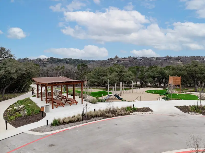 Front exterior of a new home in Wolf Ranch South Fork, Georgetown, TX, highlighting curb appeal (Image 2).