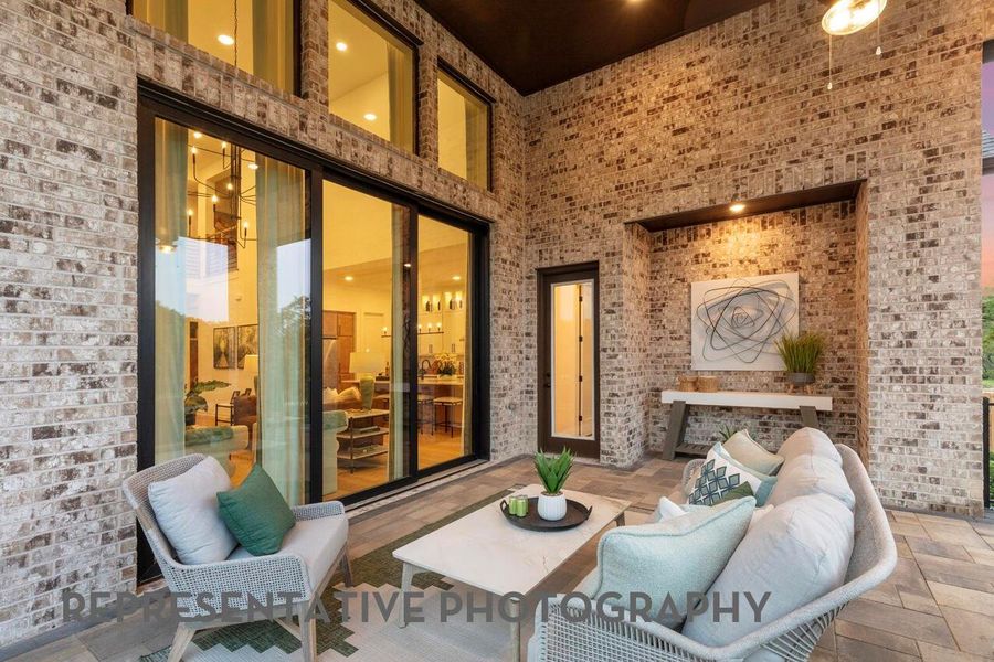 Exterior details and patio area of a home in Grand Central Park, Conroe (Image 3).