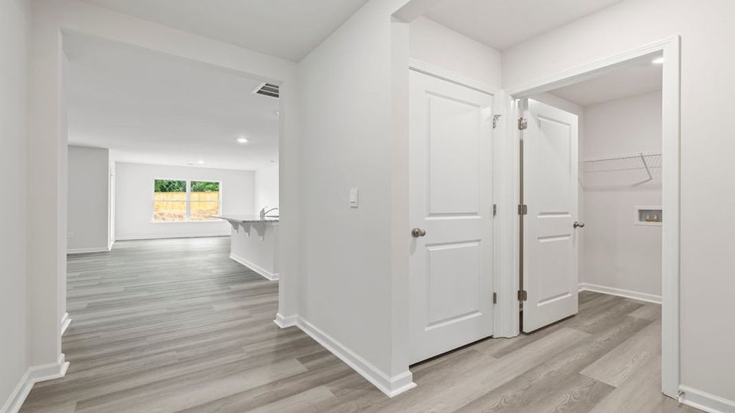 Spacious, unfurnished interior of a new home in Bentley Park, Greenwood (Image 18).