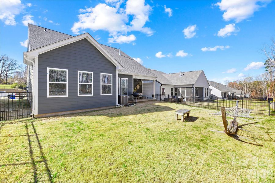 Exterior details and patio area of a home in Villas at Prestwick, Mooresville (Image 23).