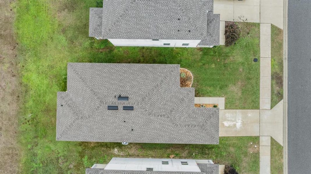 Exterior details and patio area of a home in Trilby Crossing, Brooksville (Image 21).