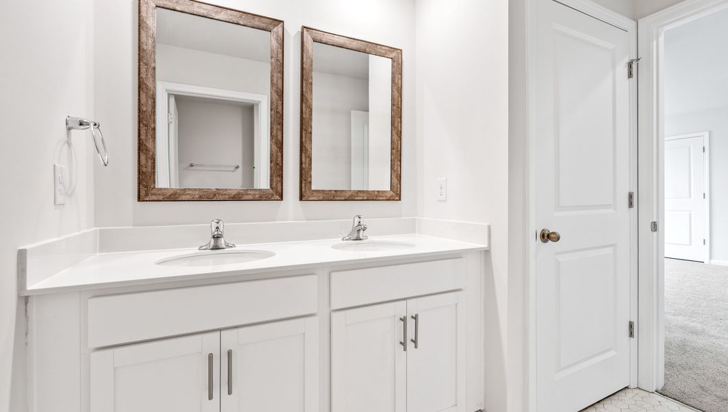 Furnished interior view inside a new home in Lakestone, Woodruff (Image 13).