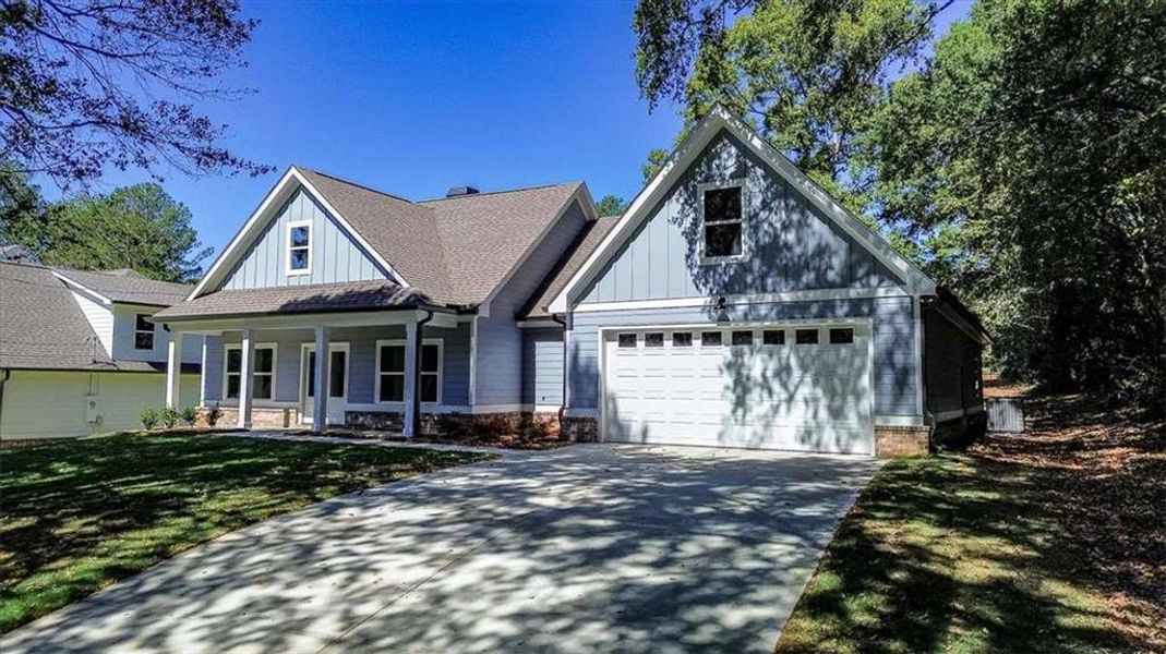 Front exterior of a new home in , Covington, GA, highlighting curb appeal (Image 23).