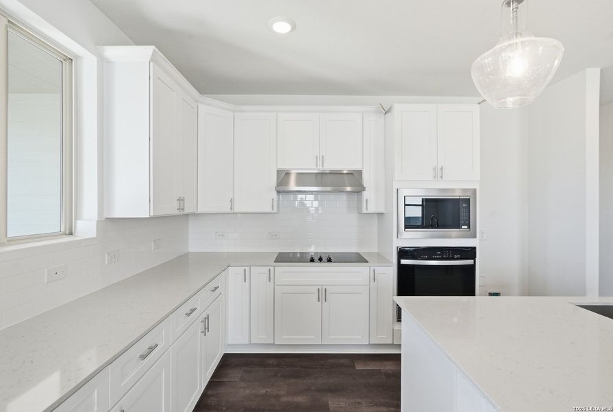 Furnished interior view inside a new home in Nopal Valley, San Antonio (Image 11).