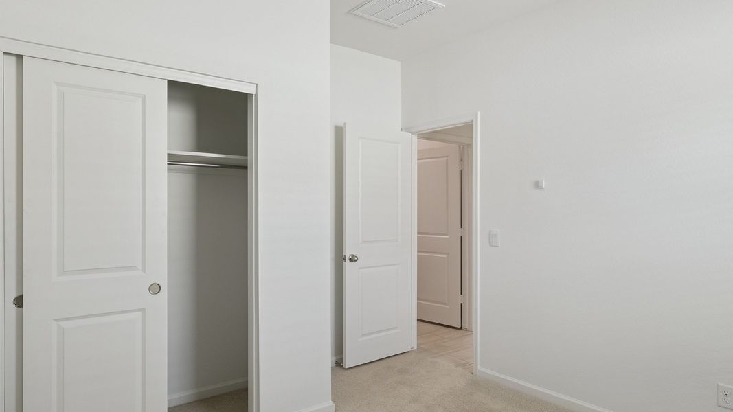 Spacious, unfurnished interior of a new home in Copper Falls, Buckeye (Image 27).