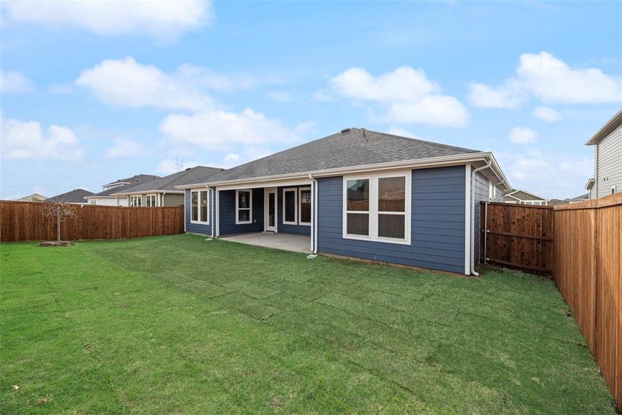 Exterior details and patio area of a home in Creekside of Crowley, Crowley (Image 3).