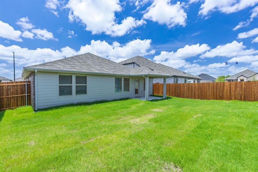 Front exterior of a new home in Stratton Place, Greenville, TX, highlighting curb appeal (Image 18). Front exterior of a new home in Stratton Place, Greenville, TX, highlighting curb appeal (Image 18).