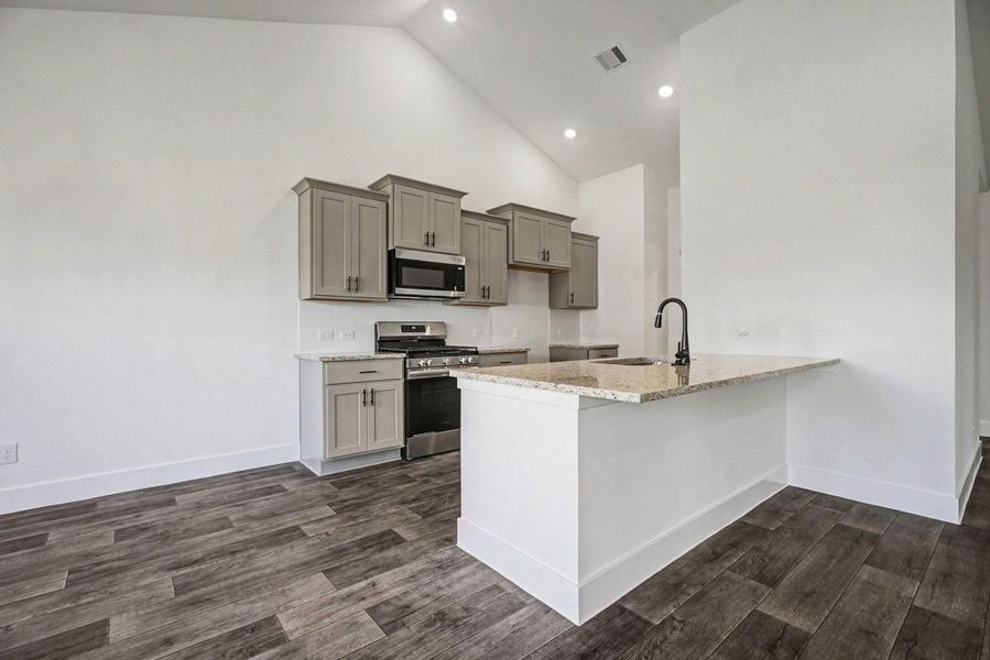 Furnished interior view inside a new home in Greystone, Angleton (Image 9).