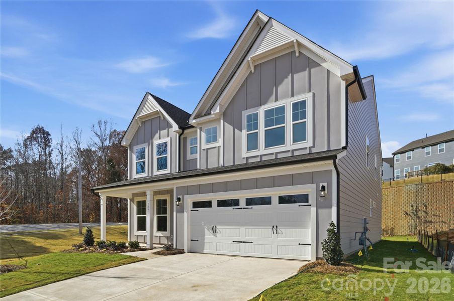 Front exterior of a new home in Summerlin, Mooresville, NC, highlighting curb appeal (Image 2). Front exterior of a new home in Summerlin, Mooresville, NC, highlighting curb appeal (Image 2).