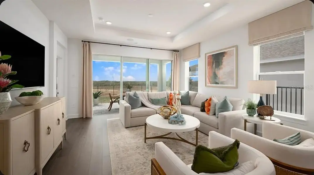 Furnished interior view inside a new home in Esplanade at McKinnon Groves, Winter Garden (Image 3).