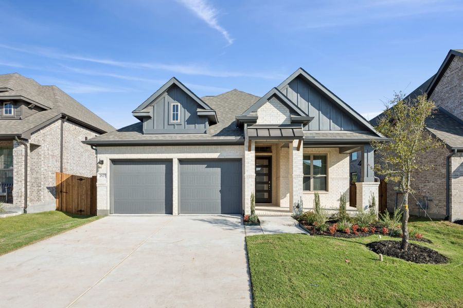 Front exterior of a new home in Avondale, Fate, TX, highlighting curb appeal (Image 20).
