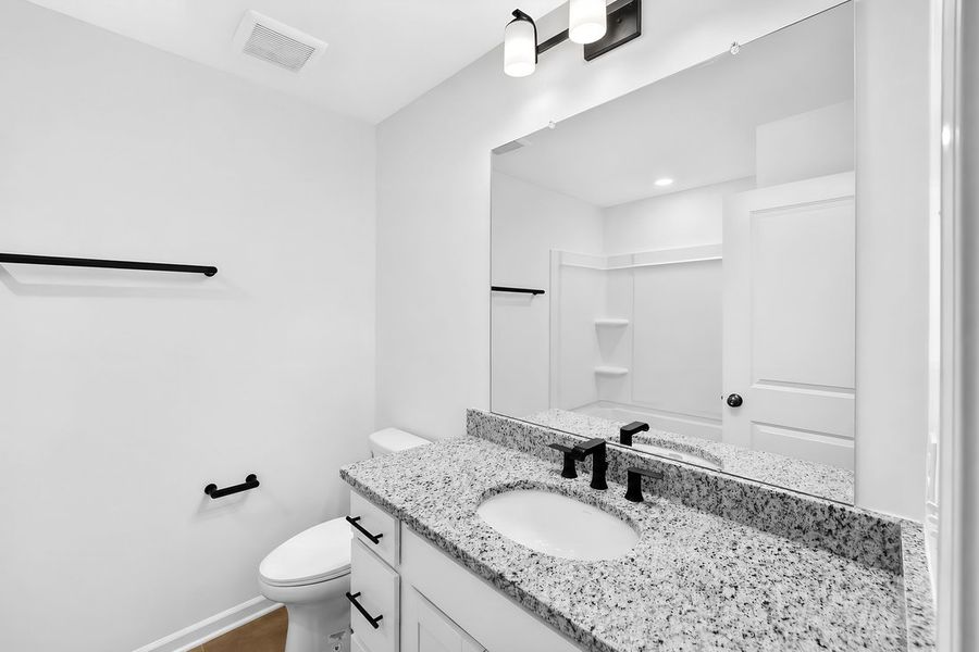 Furnished interior view inside a new home in Silverstone, Knightdale (Image 11).