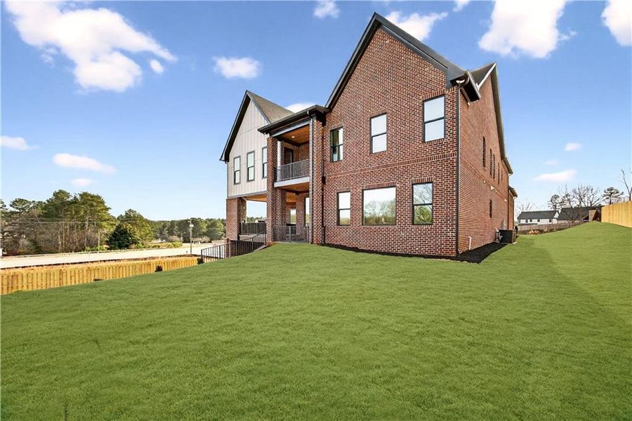 Exterior details and patio area of a home in , Buford (Image 34).
