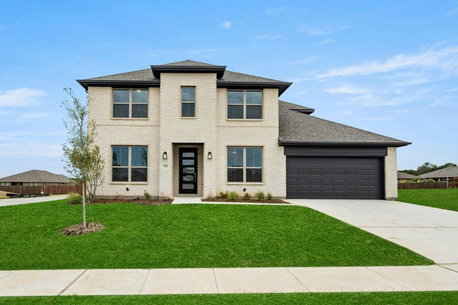 Representative exterior photo of a completed home built from the Willow by Kindred Homes in Dominion Park, Red Oak, TX (Image 43).