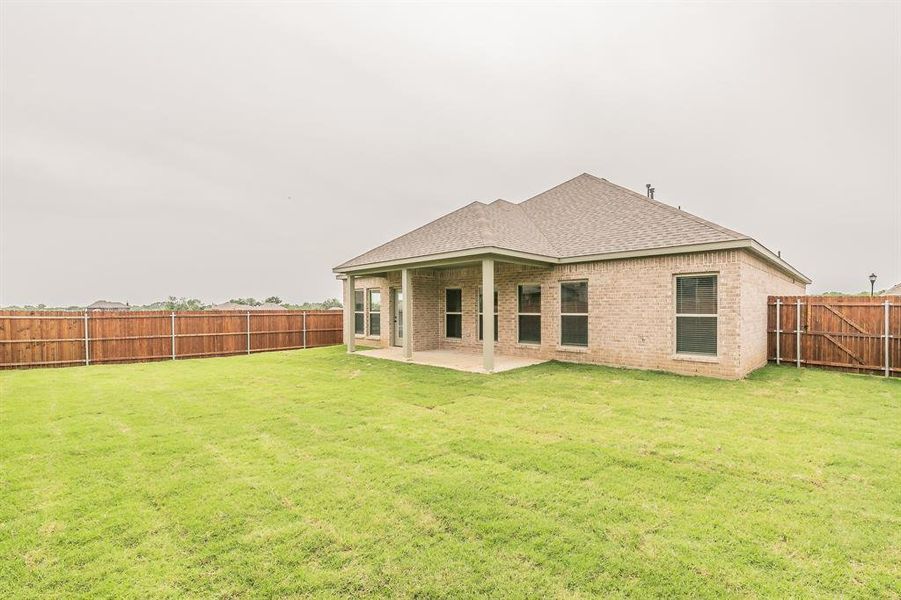 Front exterior of a new home in , Alvarado, TX, highlighting curb appeal (Image 21).