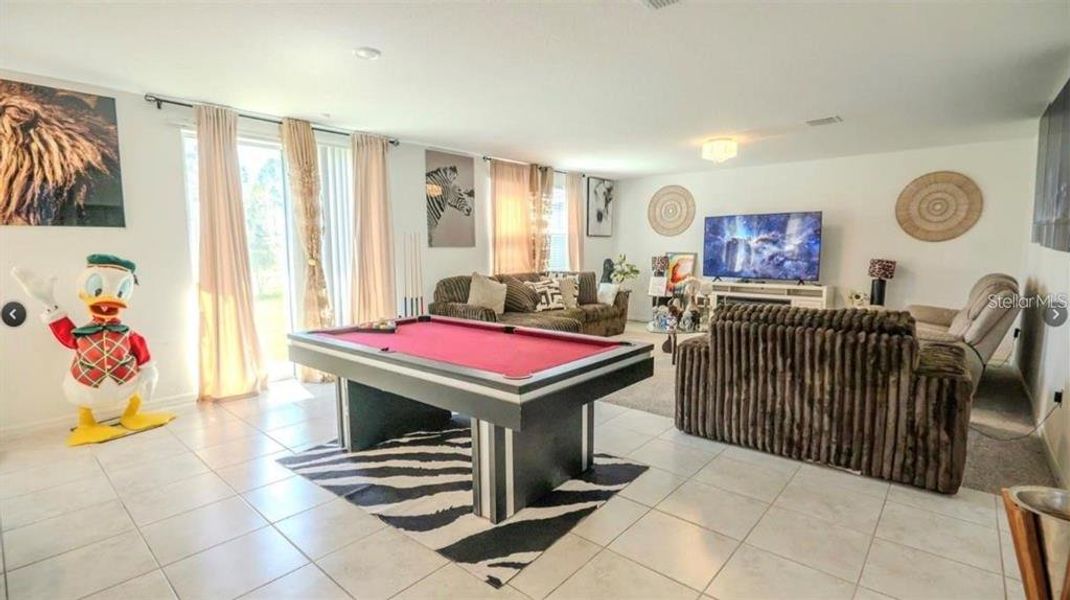 Furnished interior view inside a new home in Lake Deer Estates - Signature Series, Poinciana (Image 8).
