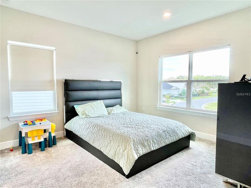 Furnished interior view inside a new home in Parkview Reserve, Orlando (Image 5).