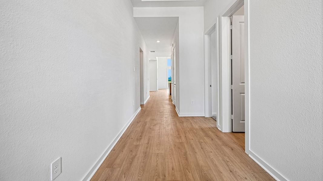 Spacious, unfurnished interior of a new home in The Enclave at Bar W Ranch, Leander (Image 23).