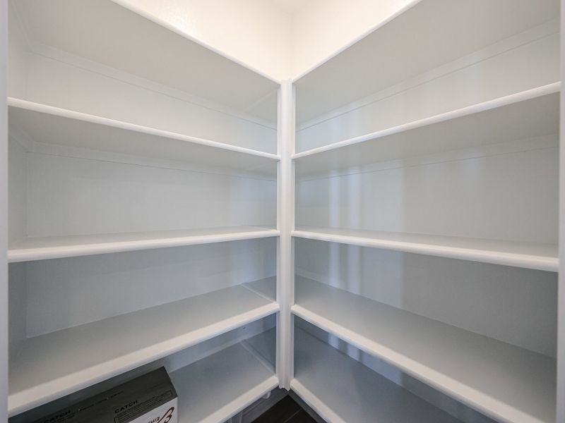 A white shelf with white shelves. A white shelf with white shelves.