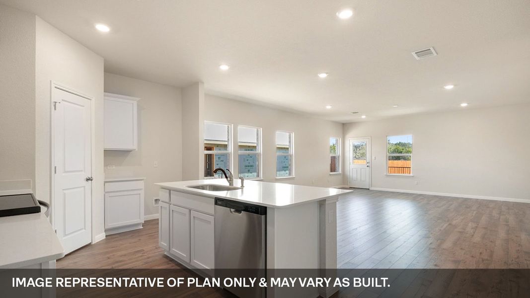Representative furnished interior of a home built from the The Quincy by D.R. Horton in Thunder Rock, Marble Falls (Image 6).