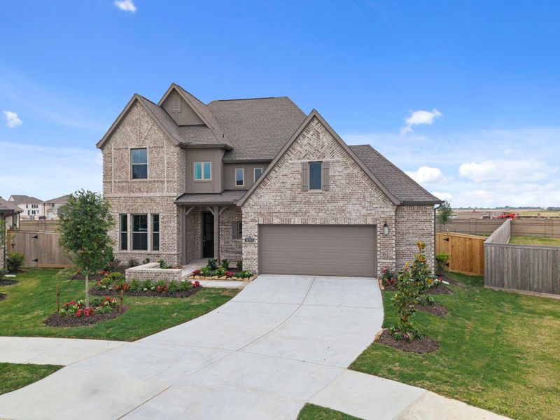 Front exterior of a new home in Bridgeland, Cypress, TX, highlighting curb appeal (Image 22).