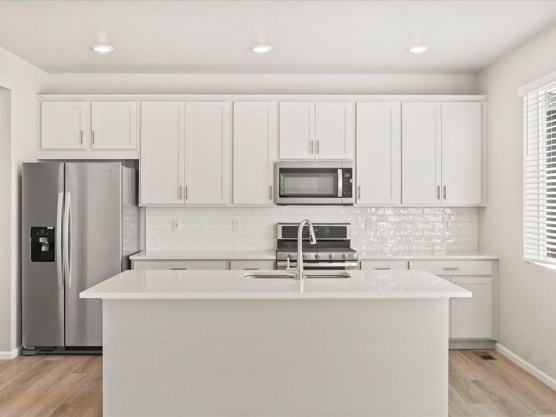 The Waterton floorplan interior image taken at a Meritage Homes community in Commerce City, CO.