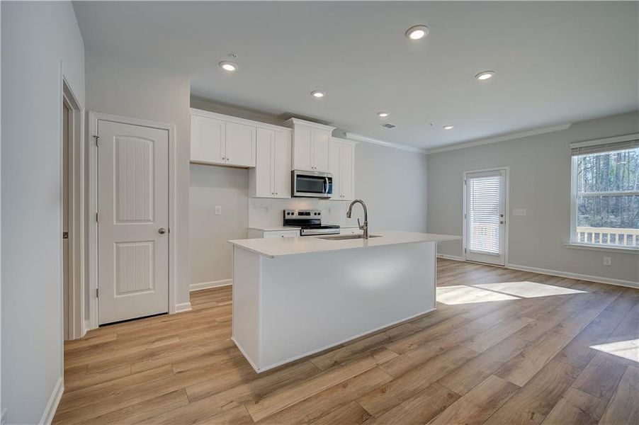 Furnished interior view inside a new home in Auburn Ridge, Riverdale (Image 6). Furnished interior view inside a new home in Auburn Ridge, Riverdale (Image 6).