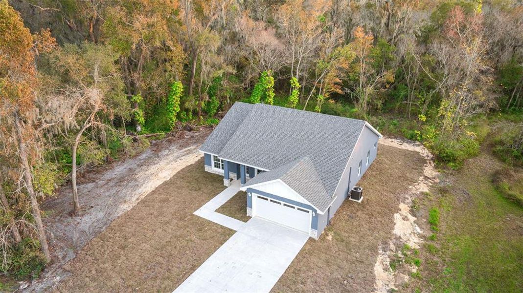 Front exterior of a new home in , Lakeland, FL, highlighting curb appeal (Image 20).