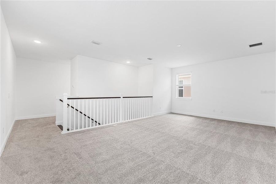 Spacious, unfurnished interior of a new home in Osprey Ranch, Winter Garden (Image 22).