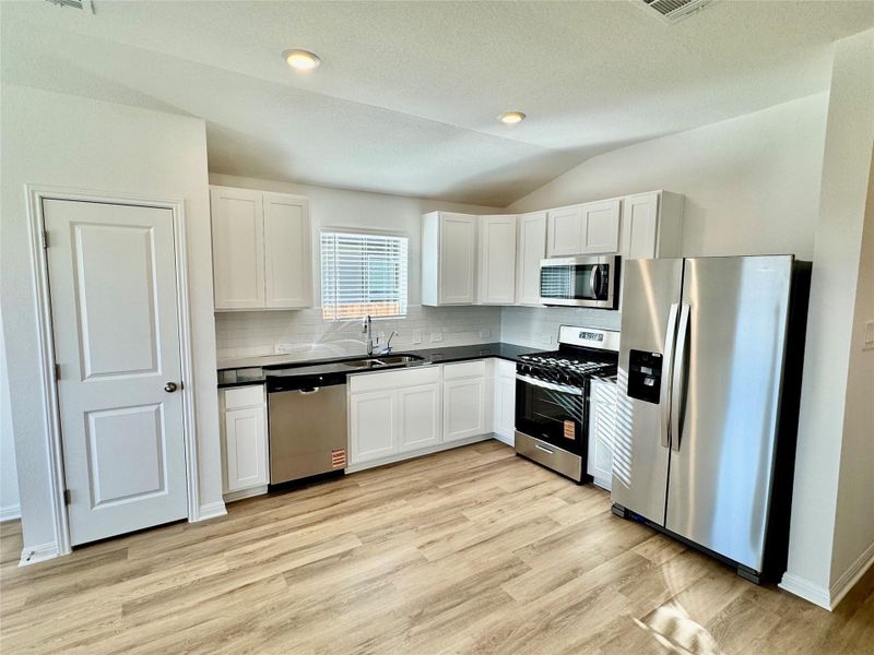 Furnished interior view inside a new home in Waterstone Crossing, Kyle (Image 7).