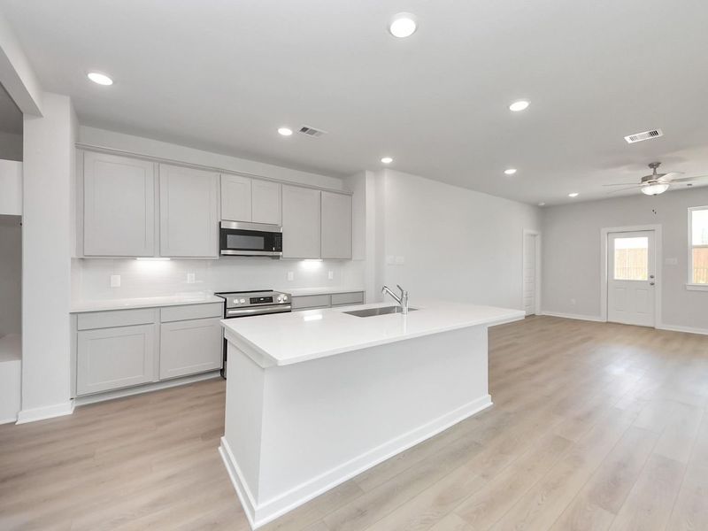 Furnished interior view inside a new home in Spring Branch Crossing, Conroe (Image 4).