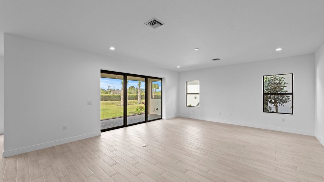 Spacious, unfurnished interior of a new home in SkySail, Naples (Image 26).