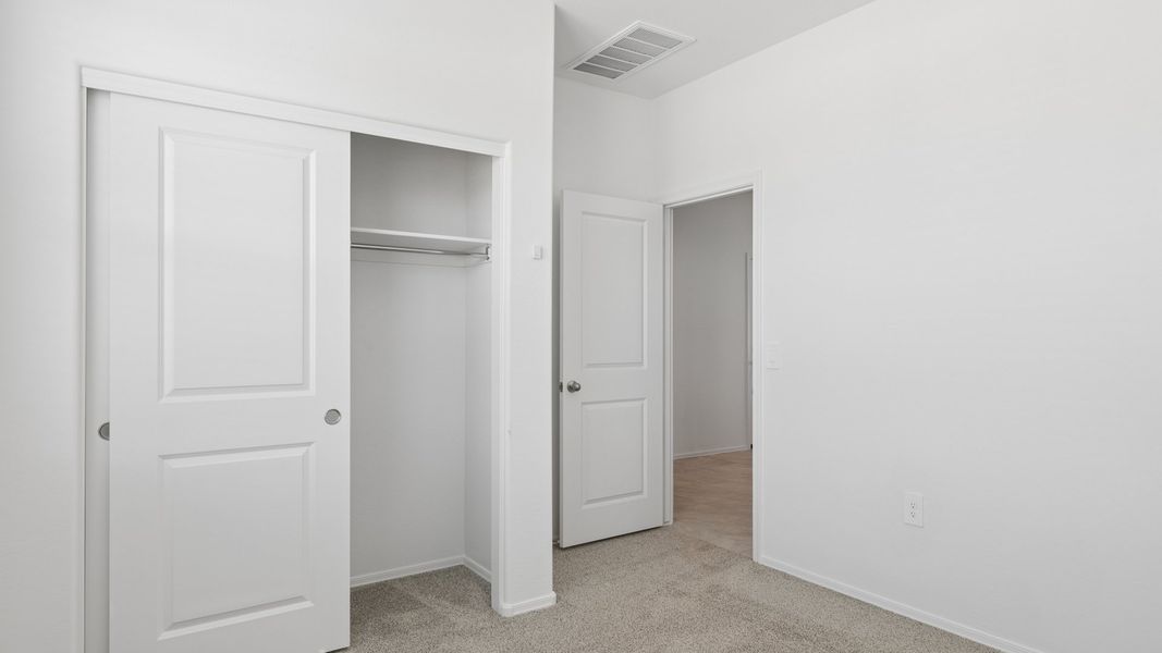 Representative unfurnished interior of a home built from the Lakeway by D.R. Horton in Heartland Ranch, Coolidge (Image 15).