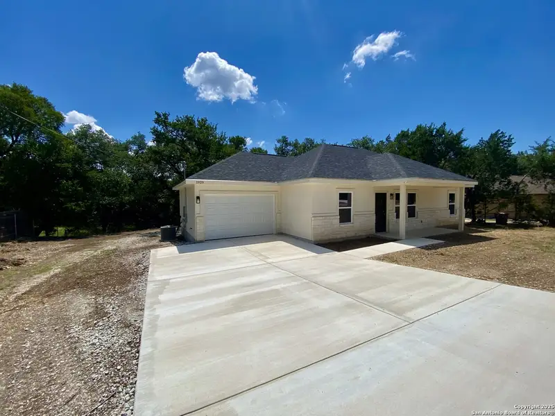 Front exterior of a new home in , Canyon Lake, TX, highlighting curb appeal (Image 9). Front exterior of a new home in , Canyon Lake, TX, highlighting curb appeal (Image 9).