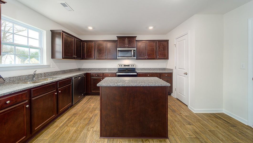 Representative furnished interior of a home built from the Harrison by D.R. Horton in Brookside Farms - The Meadows, Greer (Image 6).