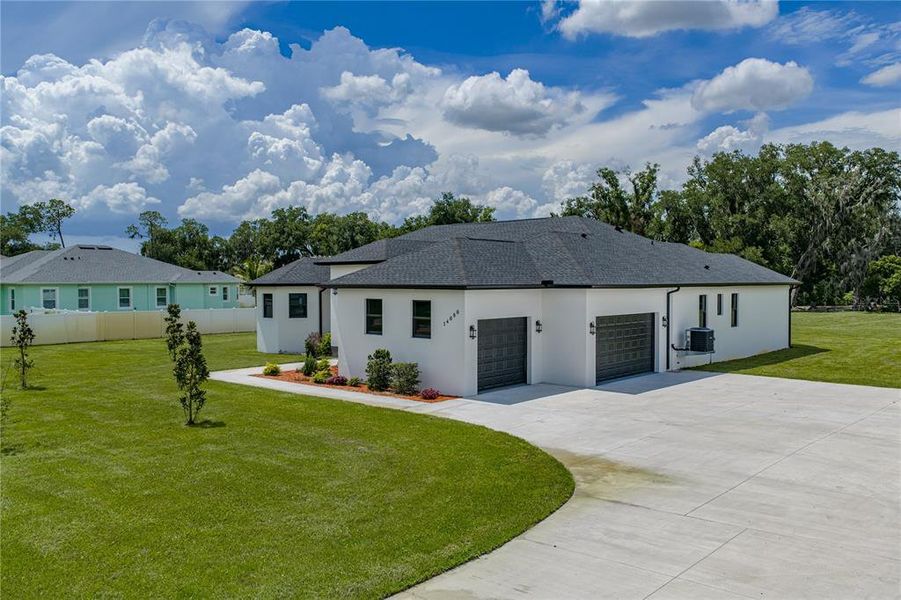 Front exterior of a new home in , Dover, FL, highlighting curb appeal (Image 28).