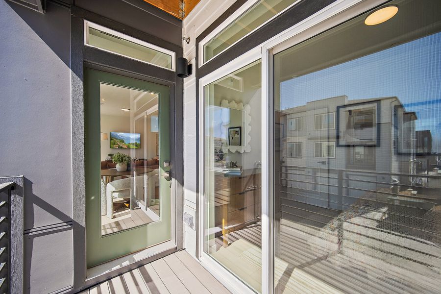 Exterior details and patio area of a home in Lyric at RidgeGate Condos, Lone Tree (Image 23).