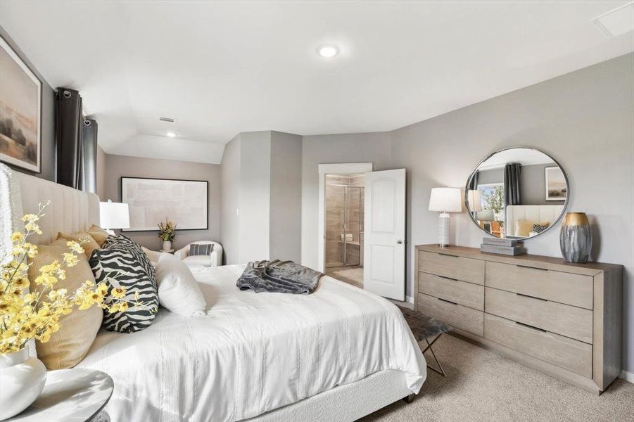 Bedroom featuring carpet flooring and ensuite bath