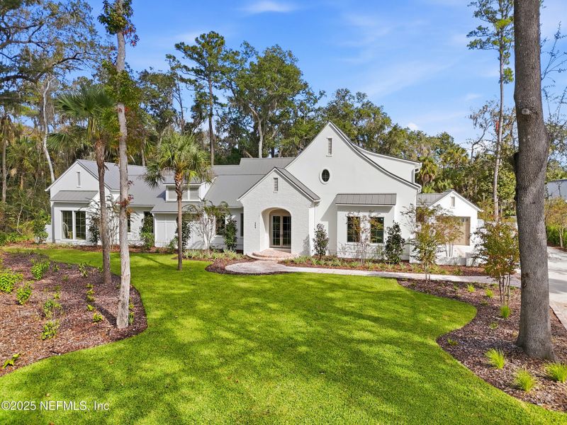 Front exterior of a new home in , Ponte Vedra, FL, highlighting curb appeal (Image 30).