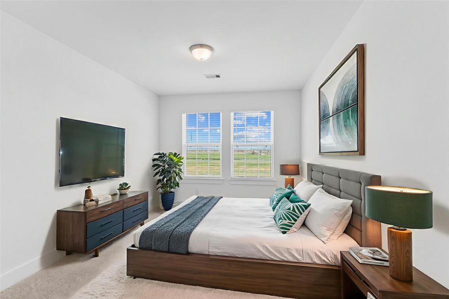 Another spacious upstairs bedroom bathed in natural light, offering comfort and versatility for guests, family, or a home office. *Virtually Staged* Another spacious upstairs bedroom bathed in natural light, offering comfort and versatility for guests, family, or a home office. *Virtually Staged*