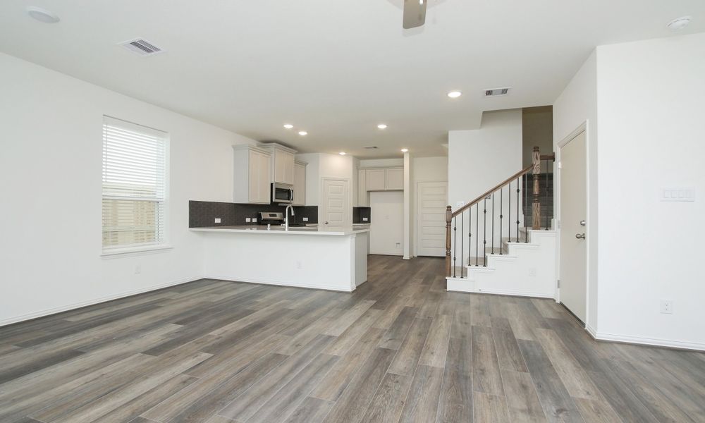 Representative unfurnished interior of a home built from the Lexington Series - Addison by Brightland Homes in Beamer Villas, Friendswood (Image 11). Representative unfurnished interior of a home built from the Lexington Series - Addison by Brightland Homes in Beamer Villas, Friendswood (Image 11).